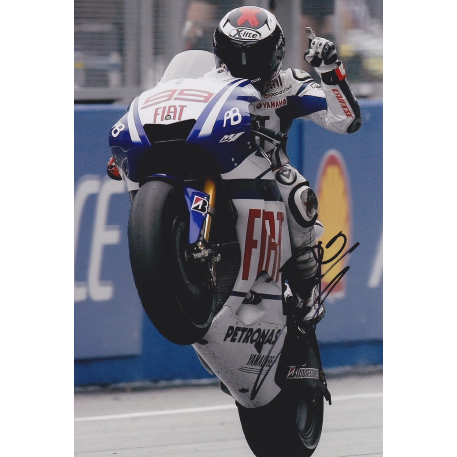 Jorge Lorenzo (#99) signed Yamaha 8x10 photo matted with Jorge Lorenzo (#99) signed Yamaha 8x10 photo matted with