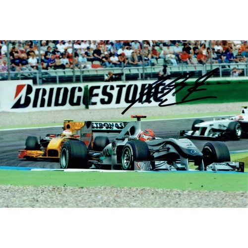 Michael Schumacher Signed 7.5 x 5 Inch F1 Mercedes German GP Photograph.